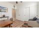 Bedroom featuring a wooden desk, a large window, and ample closet space at 3613 W Plymouth Dr, Anthem, AZ 85086