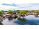 Beautiful community park featuring a playground, pond, gazebo, walking bridge, and lush landscaping at 3613 W Plymouth Dr, Anthem, AZ 85086