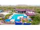 Community pool featuring lap lanes, a lounging area, and mountain views, perfect for relaxation and recreation at 3613 W Plymouth Dr, Anthem, AZ 85086