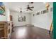 Spacious living area with wood floors and vintage hot air balloon décor at 3613 W Plymouth Dr, Anthem, AZ 85086
