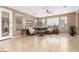 Spacious living room with neutral colors, tile floors, and lots of natural light at 3613 W Plymouth Dr, Anthem, AZ 85086