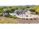 Vibrant community playground featuring colorful play structures, ample space for children, and shaded areas for comfort at 3613 W Plymouth Dr, Anthem, AZ 85086