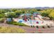 Colorful community playground featuring slides, climbing structures, and a safe play area for children at 3613 W Plymouth Dr, Anthem, AZ 85086