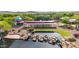 Daisy Mountain Railroad station with pond in foreground, rock waterfall feature, and lush landscaping at 3613 W Plymouth Dr, Anthem, AZ 85086