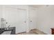 Bedroom featuring new flooring, white doors, and modern finishes at 4043 S Shady Ct, Gilbert, AZ 85297