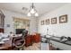 Home office with a large desk, rolling chair, and plenty of workspace at 4043 S Shady Ct, Gilbert, AZ 85297