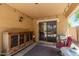 Covered patio with ornate buffet, decor, and sliding glass doors to backyard at 4043 S Shady Ct, Gilbert, AZ 85297