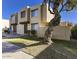Charming two-story townhome with a well-maintained lawn and mature tree in a desirable neighborhood at 4124 N 81St St, Scottsdale, AZ 85251