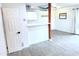 Spacious living area with neutral-toned flooring and convenient kitchen access at 4124 N 81St St, Scottsdale, AZ 85251