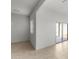 Sunlit room with tiled flooring and sliding door for access to backyard or patio at 42885 W Vincent Dr, Maricopa, AZ 85138