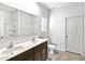 Bathroom with a double sink vanity, tile flooring, and a walk-in shower at 42895 W Vincent Dr, Maricopa, AZ 85138