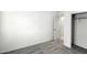Bedroom with carpet, open closet and a door leading out to the hallway at 42895 W Vincent Dr, Maricopa, AZ 85138