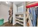 Walk-in closet with shelving, ample storage for clothing and shoes and wood floor at 4301 N 21St St # 3, Phoenix, AZ 85016