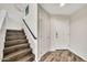 Welcoming entryway featuring a staircase, tile flooring, and neutral wall paint at 4301 N 21St St # 3, Phoenix, AZ 85016