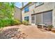 Charming backyard brick patio offers outdoor seating, lush greenery, and space for relaxing at 4301 N 21St St # 3, Phoenix, AZ 85016
