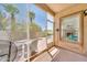 Screened patio with tiled floor and a view of the backyard at 4301 N 21St St # 3, Phoenix, AZ 85016