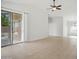 Living room with tile flooring, ceiling fan, and natural light at 44010 W Wade Dr, Maricopa, AZ 85138