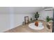 Stylish bonus room with wood floors, accent plants, and a cozy seating area at 4416 N 37Th Way, Phoenix, AZ 85018