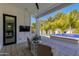 Inviting outdoor living space with covered patio, pool view, and comfortable seating at 4416 N 37Th Way, Phoenix, AZ 85018