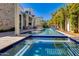 Sparkling pool with cascading water features and resort-style landscaping at 4416 N 37Th Way, Phoenix, AZ 85018