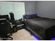 Cozy bedroom with a comfortable bed, modern decor, and ambient lighting at 4507 E Saint Catherine Ave, Phoenix, AZ 85042