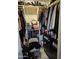 Organized walk-in closet with shelving, drawers, and hanging space for optimal storage solutions at 4507 E Saint Catherine Ave, Phoenix, AZ 85042