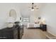Bright bedroom featuring neutral tones, a ceiling fan and ample natural light at 510 N Alma School Rd # 252, Mesa, AZ 85201