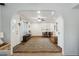 Open concept living room leading to dining area with modern decor and ample natural light at 510 N Alma School Rd # 252, Mesa, AZ 85201