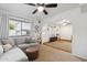 Comfortable living room with a sectional couch, neutral tones, and views to the dining area at 510 N Alma School Rd # 252, Mesa, AZ 85201