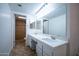 Bathroom with double sink vanity and shower at 5217 N 18Th Dr, Phoenix, AZ 85015