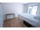 Bedroom with sliding glass door to backyard and black desk at 5217 N 18Th Dr, Phoenix, AZ 85015
