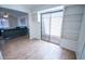 Bright living area with built-in shelves, sliding glass door, and seamless access to other spaces for easy living at 5217 N 18Th Dr, Phoenix, AZ 85015