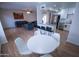 Inviting space combines kitchen, dining, and living areas creating an open layout filled with natural light and modern decor at 5217 N 18Th Dr, Phoenix, AZ 85015