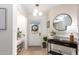 Bright entryway with modern lighting, stylish decor, and a welcoming atmosphere at 5238 E Beck Ln, Scottsdale, AZ 85254