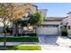 Charming two-story home with lush landscaping and a two-car garage at 5329 E Harmony Ave, Mesa, AZ 85206