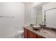 Modern bathroom featuring a vessel sink, granite countertop, and glass shower at 5450 E Deer Valley Dr # 4199, Phoenix, AZ 85054