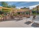 Outdoor grilling area for residents, featuring multiple grills and shaded seating at 5450 E Deer Valley Dr # 4199, Phoenix, AZ 85054