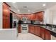 Well-equipped kitchen with stainless steel appliances, granite counters, and custom cabinetry at 5450 E Deer Valley Dr # 4199, Phoenix, AZ 85054