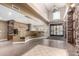 Elegant lobby area with stone accents, tile flooring, and a comfortable seating area at 5450 E Deer Valley Dr # 4199, Phoenix, AZ 85054