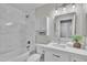 Modern bathroom featuring tub, shower, and vanity with white marble at 6027 E Sayan Cir, Mesa, AZ 85215