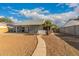 The backyard presents a blank canvas for gardening and outdoor living projects at 6038 W Gelding Dr, Glendale, AZ 85306