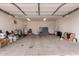 Spacious two-car garage providing ample parking and additional storage capacity at 6038 W Gelding Dr, Glendale, AZ 85306