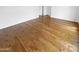Neutral bedroom features hardwood floors, white walls, and a large window at 6617 W Cavedale Dr, Phoenix, AZ 85083