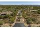 Expansive aerial view of a desert community, showcasing the unique homes nestled amidst the natural landscape at 6621 E Oberlin Way, Scottsdale, AZ 85266