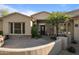 Inviting home exterior with desert landscaping and beautiful stone accents at 6621 E Oberlin Way, Scottsdale, AZ 85266