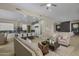 Bright and spacious living room with modern furnishings, open to a well-equipped kitchen, and stylish decor at 6621 E Oberlin Way, Scottsdale, AZ 85266