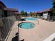 Relaxing community pool area with lounge chairs, surrounded by well-maintained landscaping and residential buildings at 700 W University Dr # 203, Tempe, AZ 85281