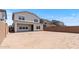 Backyard featuring desert landscaping and a large brick wall for privacy at 7420 S 76Th Ln, Laveen, AZ 85339