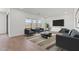 Spacious living area with ample natural light and contemporary furnishings at 7420 S 76Th Ln, Laveen, AZ 85339