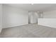 Open loft space with neutral carpeting, offering versatile living options at 7420 S 76Th Ln, Laveen, AZ 85339